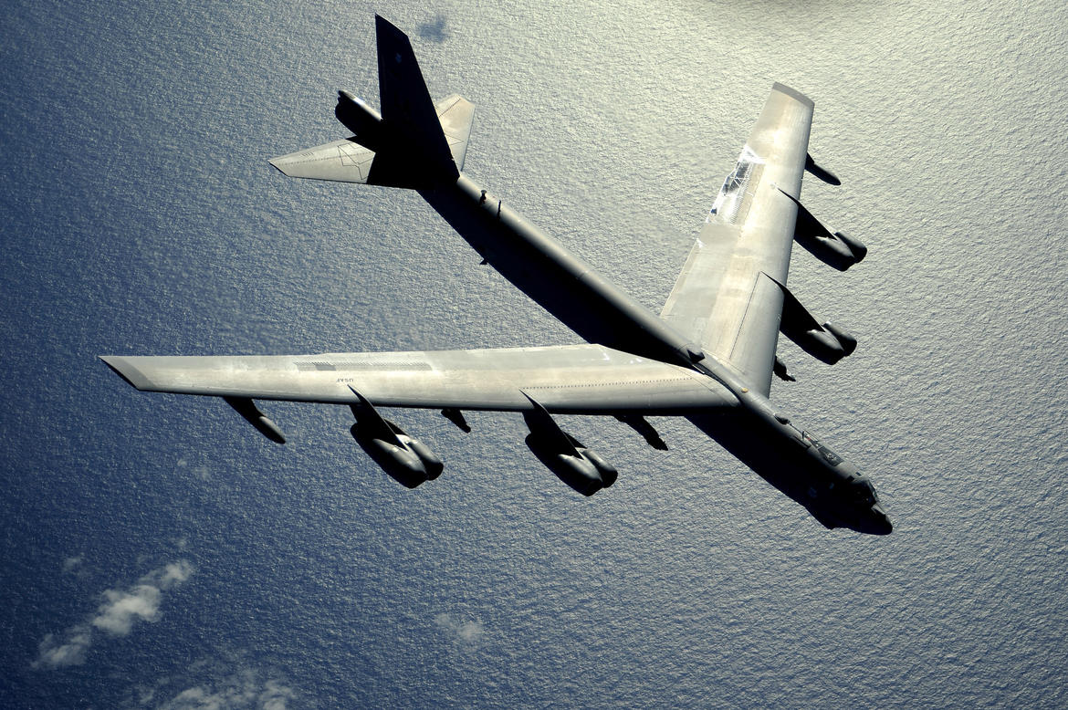 A B-52 Stratofortress flies over the Pacific Ocean after an air refueling in support of exercise Rim of the Pacific, July 10, 2010.